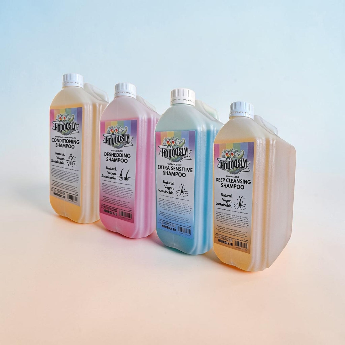 Frente Perfumada Ltd, T/A Houndsly EU Pet Products Groomers Go-To Bundle: four professional pet shampoos in yellow, pink, blue, and orange.
