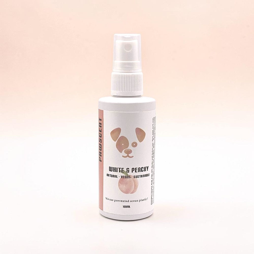 Frente Perfumada Ltd, T/A Houndsly EU Pet Products White & Peachy Pawscent spray bottle with dog paw logo and peach graphic.