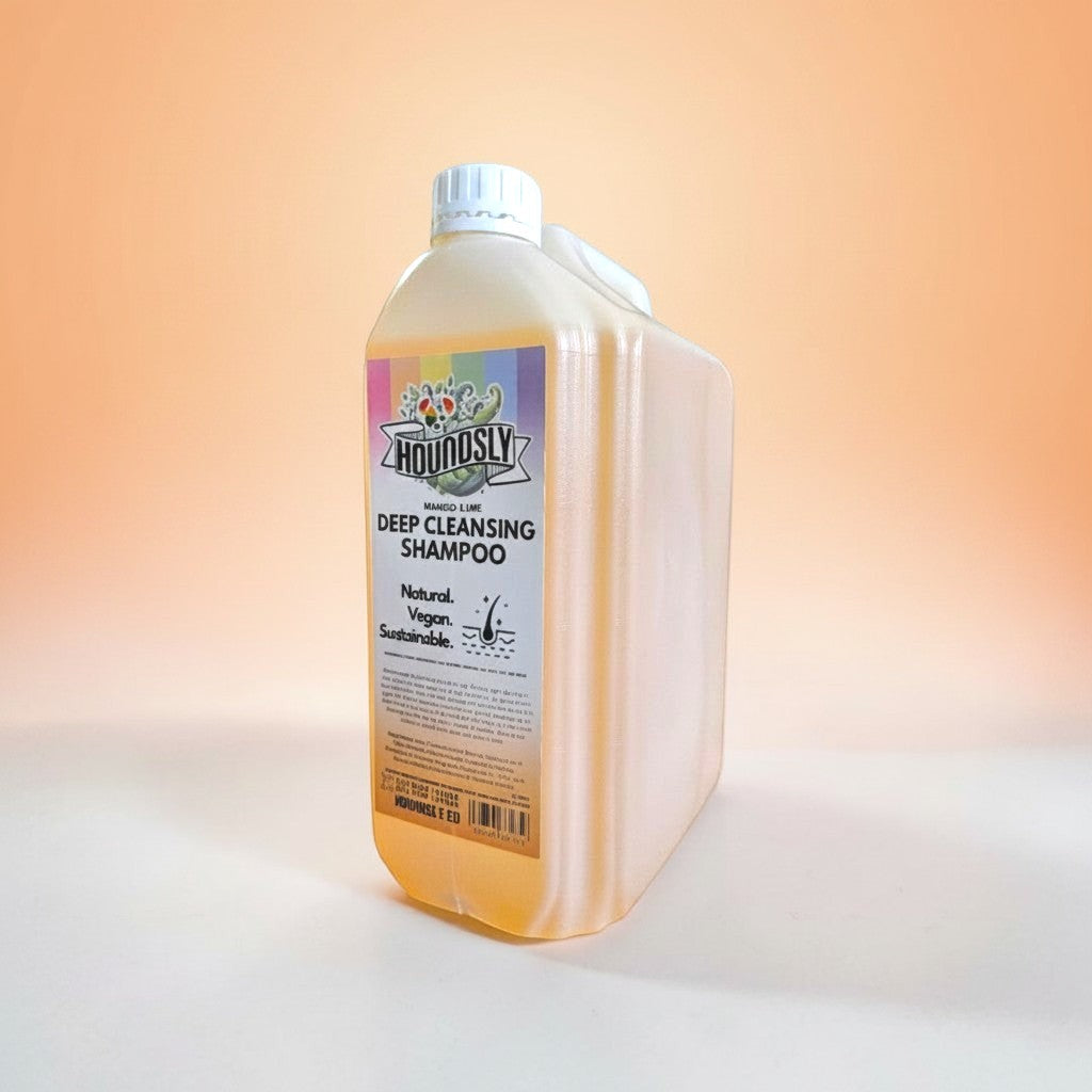 Houndsly Deep Cleansing Dog Shampoo in Mango & Lime scent. Natural, vegan, sustainable formula in a large plastic bottle.
