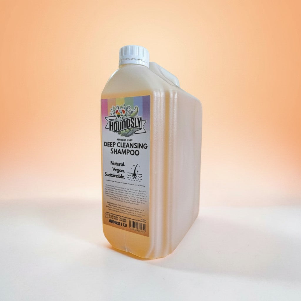 Houndsly Deep Cleansing Dog Shampoo in Mango & Lime scent. Natural, vegan, sustainable formula in a large plastic bottle.