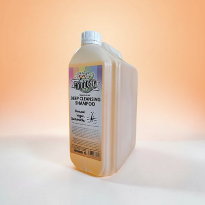 Houndsly Deep Cleansing Dog Shampoo in Mango & Lime scent. Natural, vegan, sustainable formula in a large plastic bottle.