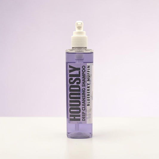 Houndsly EU Pet Products Blueberry Muffin Deep Cleansing Dog Shampoo in a clear pump bottle.