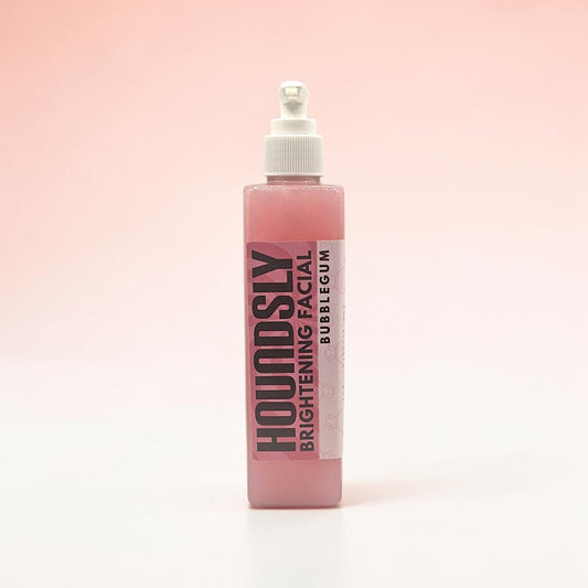 Houndsly EU Pet Products Bubblegum Brightening Facial treatment in a pink bottle with a pump dispenser. Deep conditioning formula.