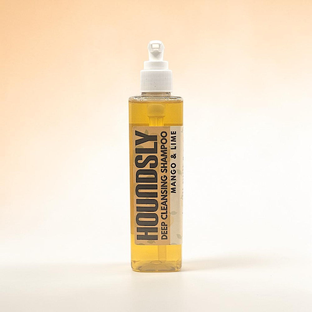 Houndsly EU Pet Products Mango & Lime deep cleansing dog shampoo in a clear bottle with a pump dispenser.