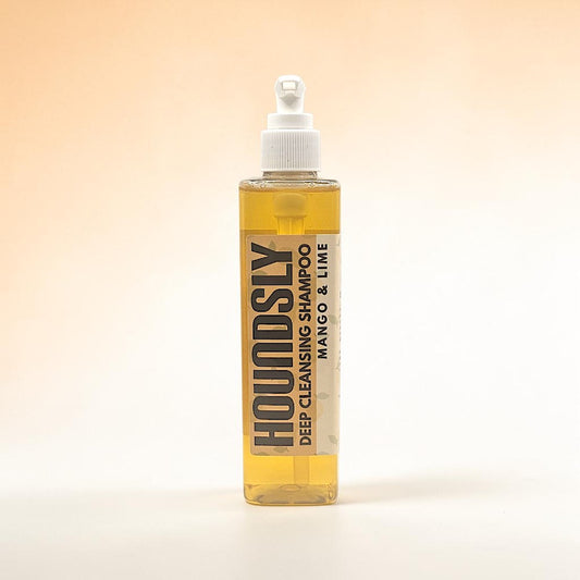 Houndsly EU Pet Products Mango & Lime deep cleansing dog shampoo in a clear bottle with a pump dispenser.