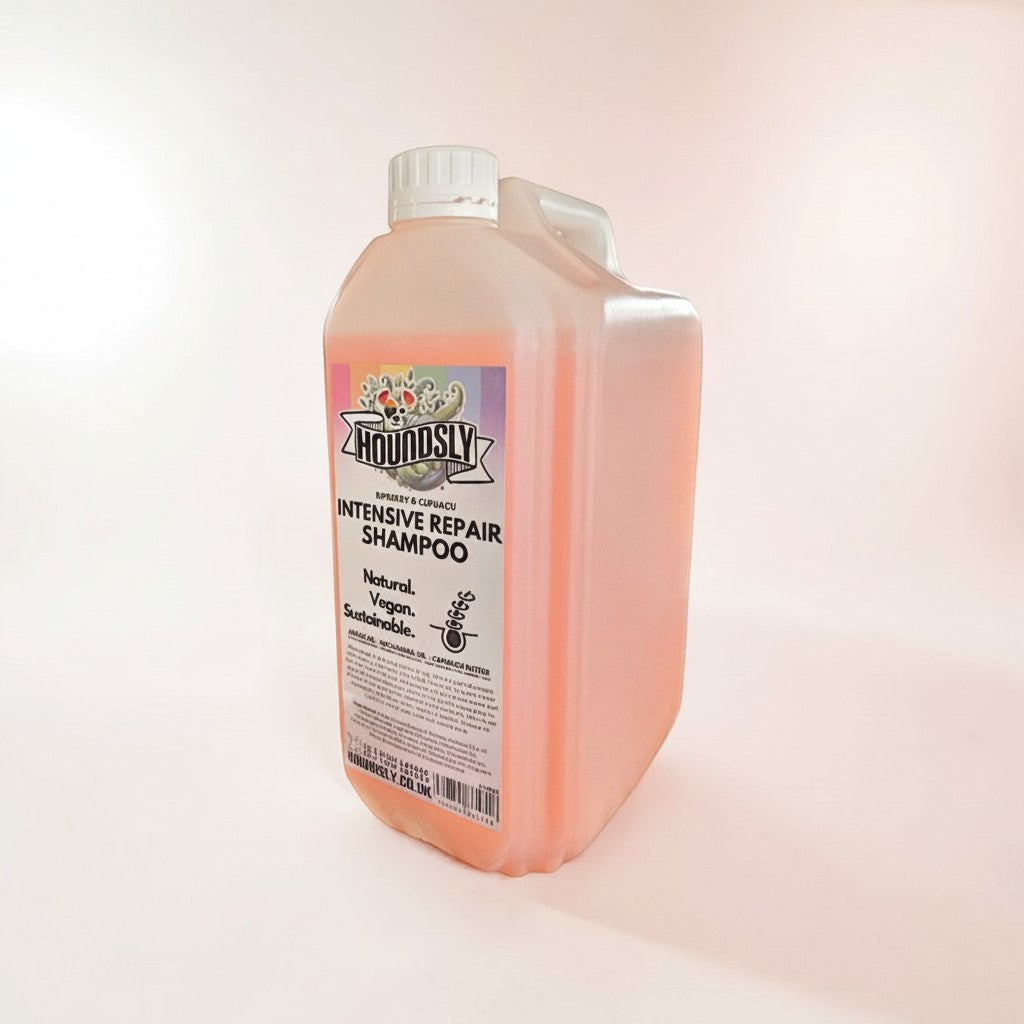 Frente Perfumada Ltd, T/A Houndsly EU Pet Products Intensive Repair Dog Shampoo bottle with Riberry and Cupuacu, natural, vegan, sustainable formula.